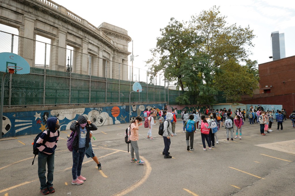 New York’s latest COVID madness: Masked, socially distanced
high-school wrestling 1
