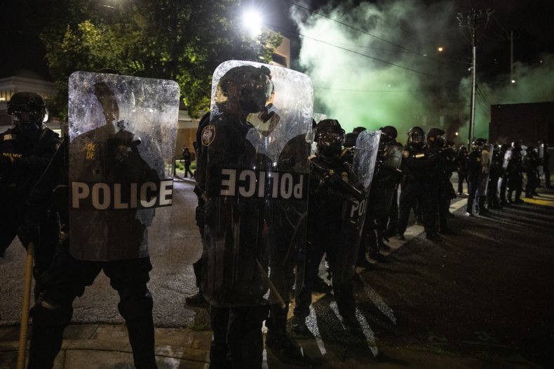 Portland, Oregon May Pay $100K to Protestor Who Says He Was
Arrested for Not Giving Up Sign 1