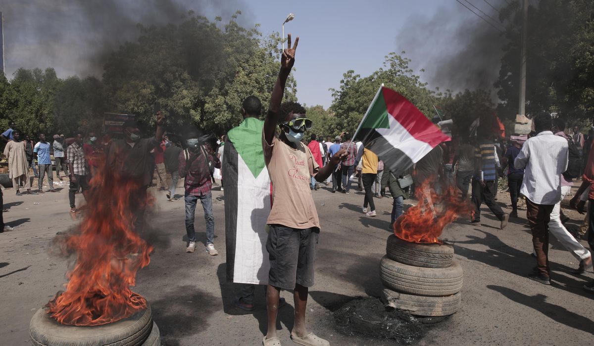 Mass anti-coup protests in Sudan mark uprising
anniversary 1