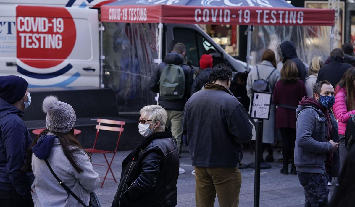 U.S. faces a double coronavirus surge as omicron
advances 1
