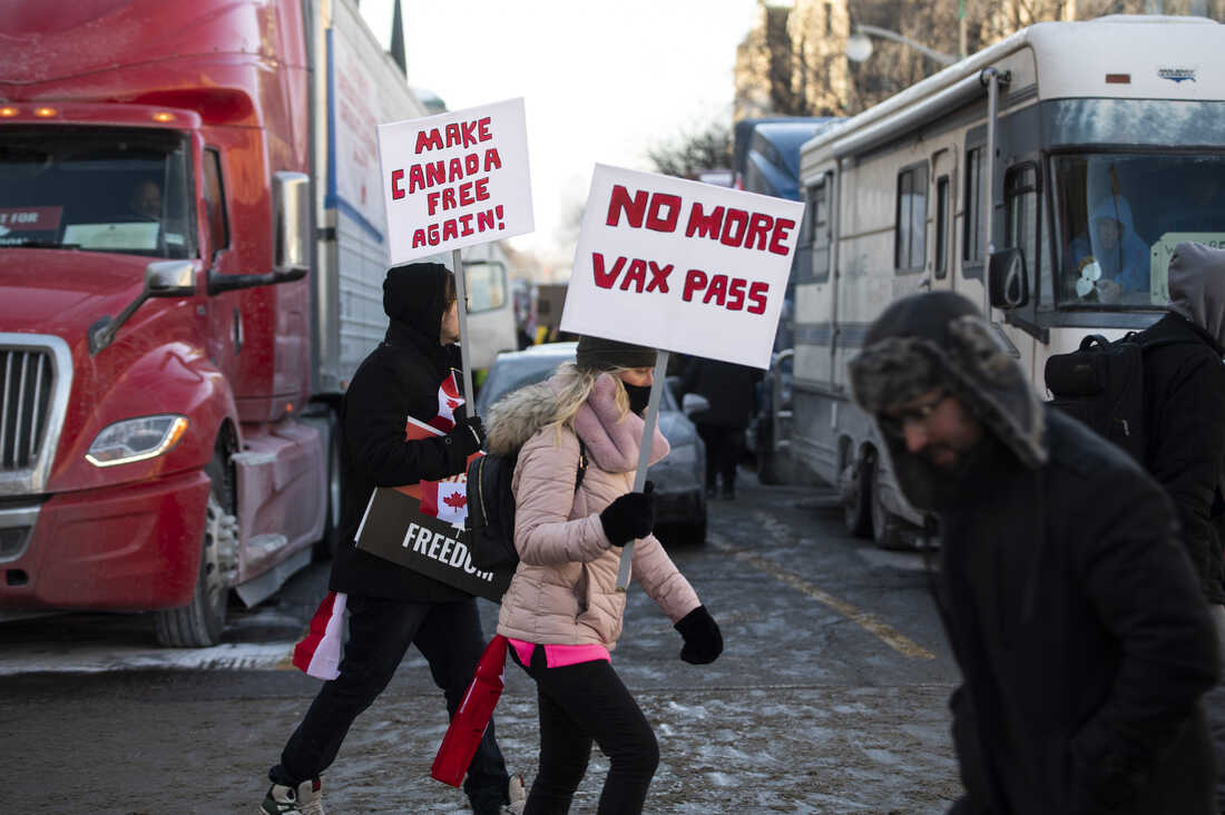 A cross-country truck convoy reaches Canada's capital to
protest COVID restrictions 1