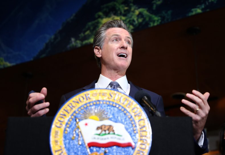 Gavin Newsom Defends 'Judicious' Mask Wearing After Magic
Johnson Photo 1
