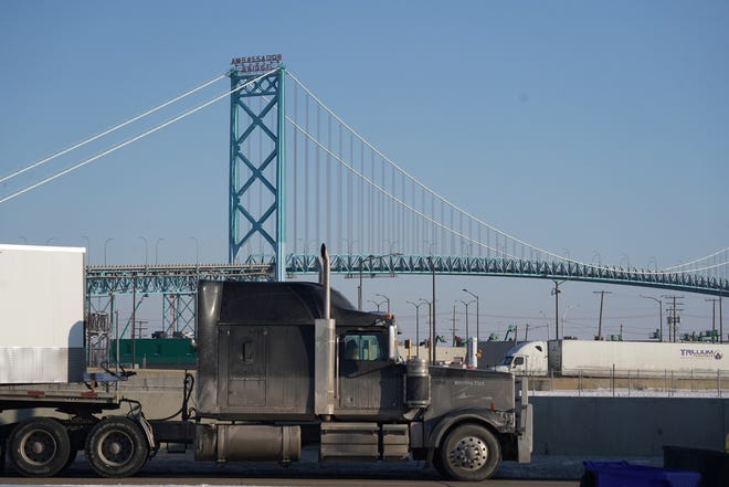 Trucker protest at US-Canada bridge over COVID vaccine
mandates enters third day 1