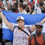 Migrants are sewing their lips shut to protest the policy
that stranded them in Mexico 1