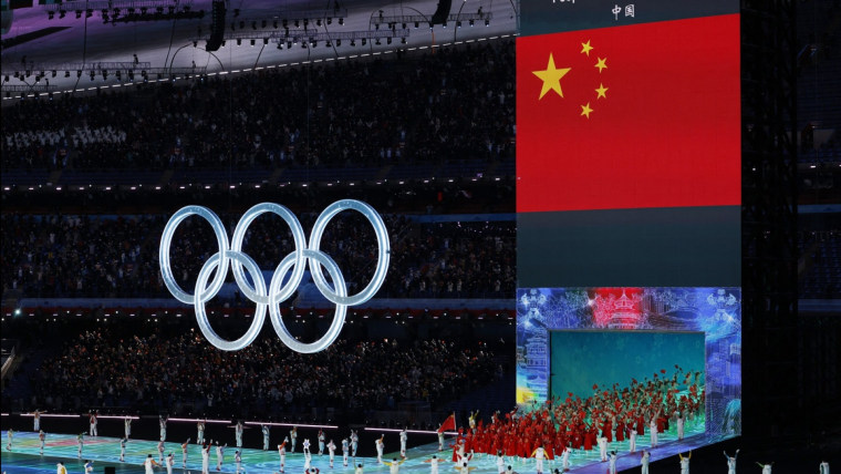 China chooses Uyghur torchbearer at Winter Olympics opening
ceremony 1