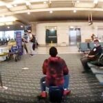 Officer chases woman riding motorized suitcase in Orlando
airport 11