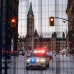 Ottawa police appear to end protesters’ hold of streets near
Canada's Parliament 8