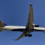Delta passenger tried to open plane’s emergency exit, wanted
to share vaccine thoughts: feds 11