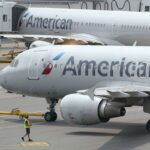 American Airlines passenger facing federal charges for
allegedly attempting to open plane door mid-flight 12