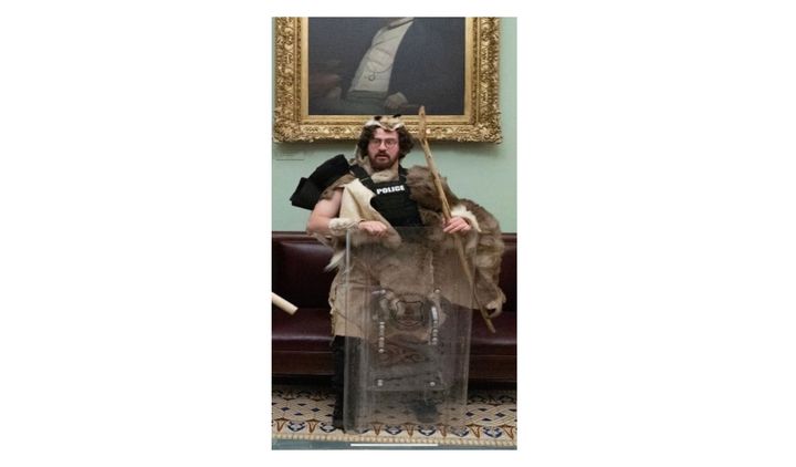 Capitol Rioter Dressed As Caveman Pleads Guilty To Stealing
Police Gear 1