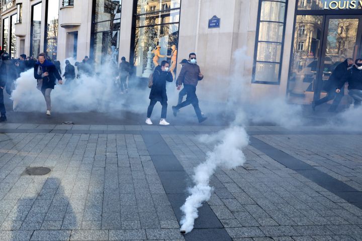 Paris Police Fire Tear Gas To Disperse Anti-Mandate
Protesters 1