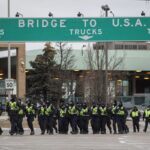 Canada police arrive to remove protesters at U.S.
border 17