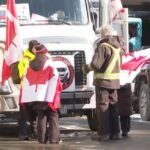 Police arrest two leaders of protesting truckers in Canada's
capital 12