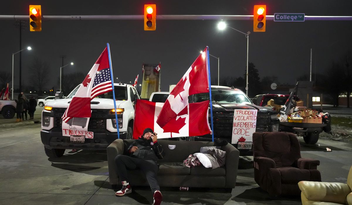Canada warns of supply shocks, blocked goods due to trucker
protest 1