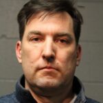 Chicago Police officer charged with punching man who
allegedly shot at cops in University Village 15