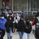 Pritzker school mask mandate losing steam as school
districts go mask optional 12