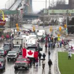 Canadian authorities turn up pressure on protesting
truckers 19