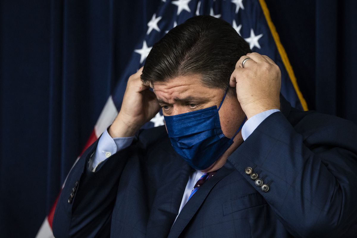 Masker aid? Pritzker expected to reveal plan Wednesday to
allow Illinoisans to go barefaced indoors again 1