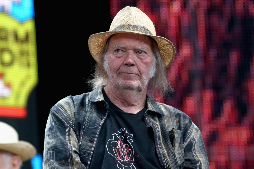 Neil Young music suddenly returns to Spotify after Joe Rogan
protest 1