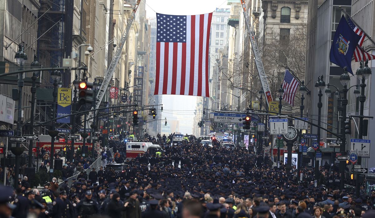 NYPD officer shot in attempted carjacking ahead of Biden
visit to discuss crime 1