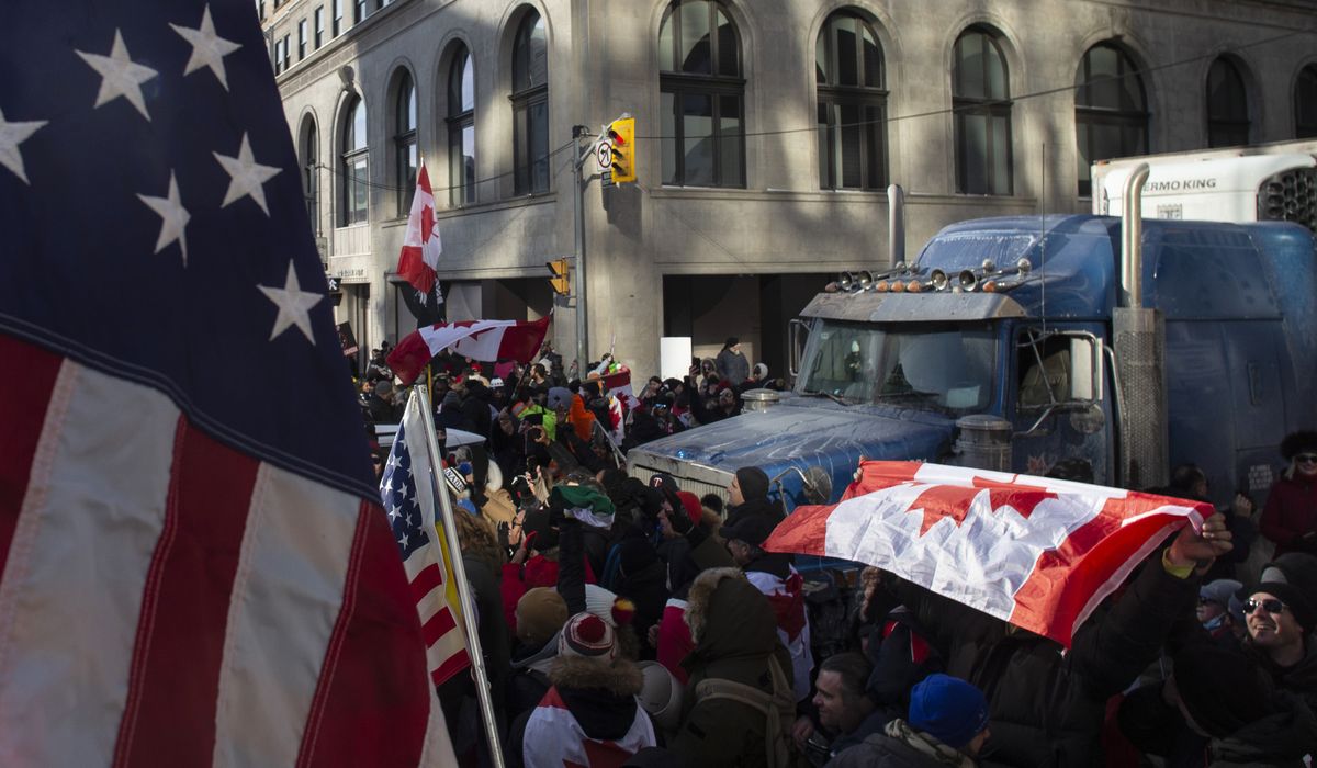 Bystanders object as man arrested for car-honking in Ottawa
in support of trucker protest 1
