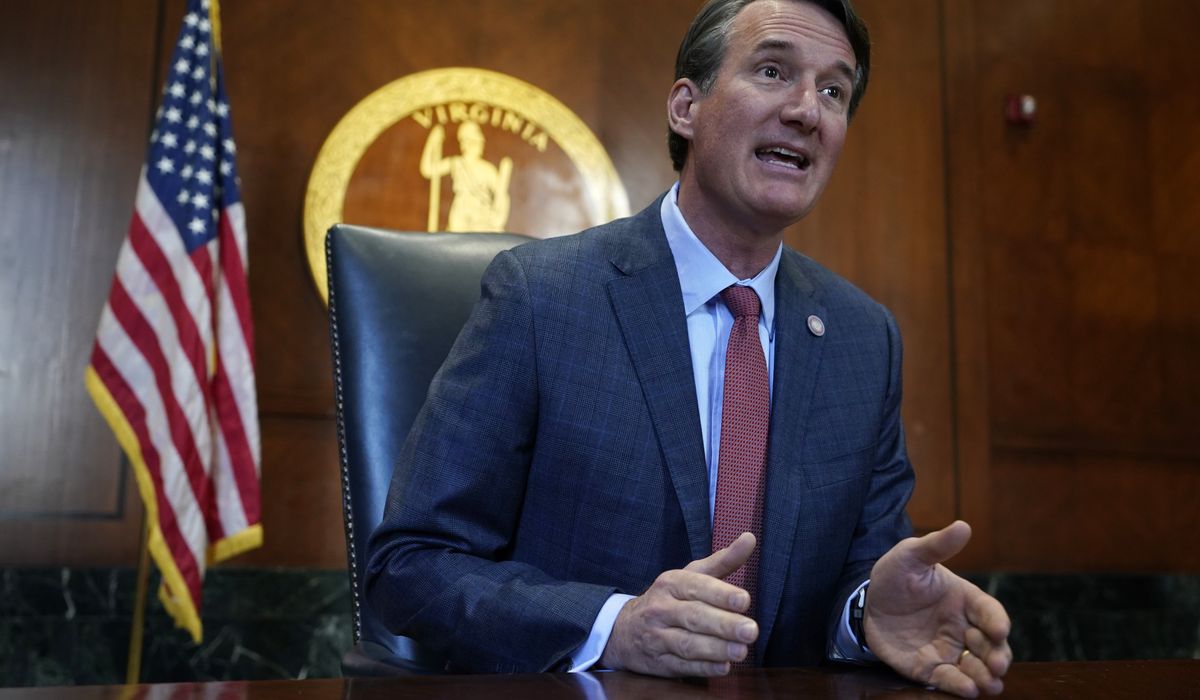Virginia governor seeks March 1 end to school mask
mandates 1
