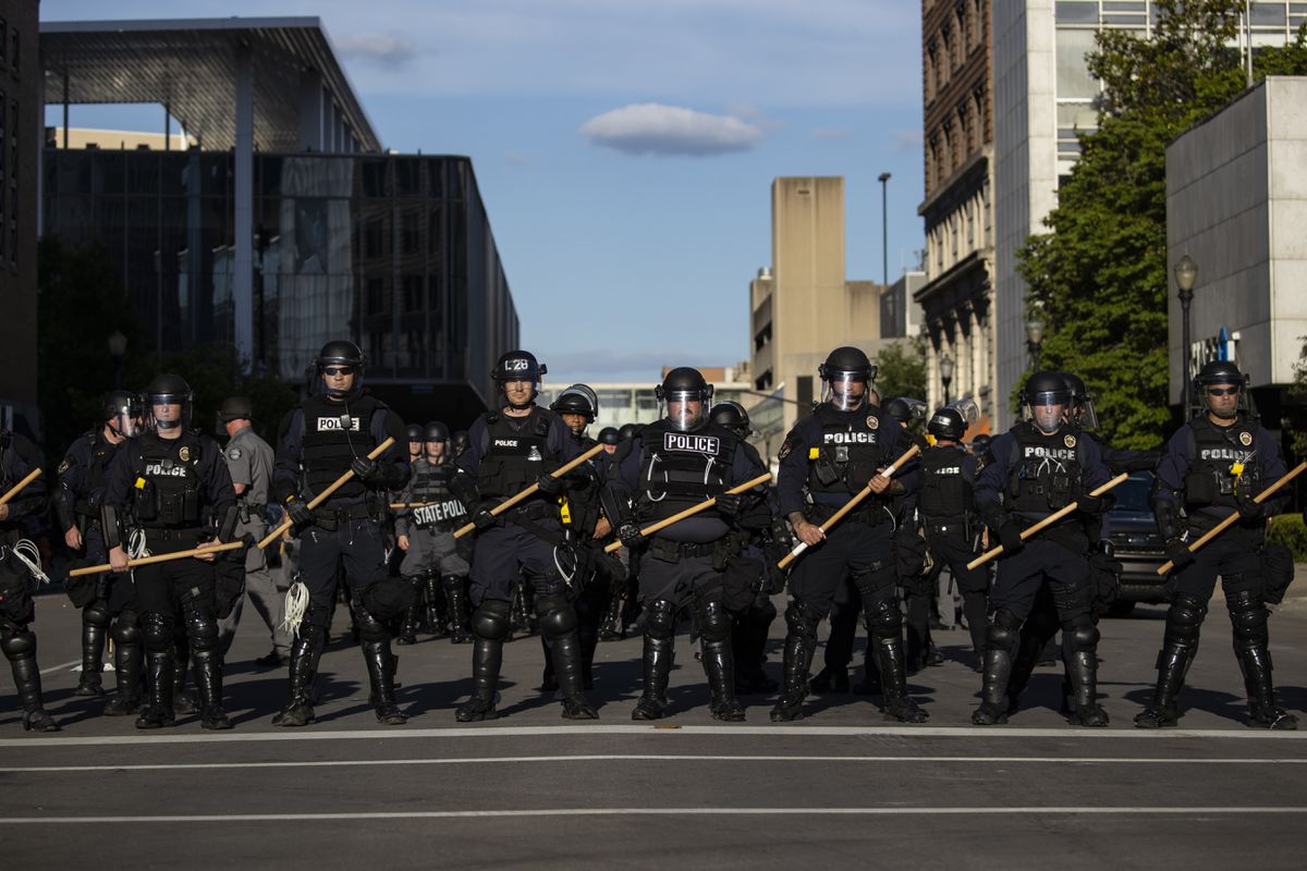 Louisville cop gets 2 years in prison for smacking protester
in head with baton 1 Louisville cop gets 2 years in prison for smacking protester
in head with baton 1