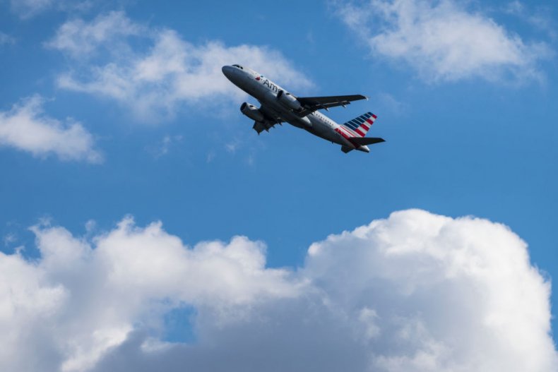 Flight Attendant Uses Coffee Pot to Stop Passenger From
Opening Plane Door 1