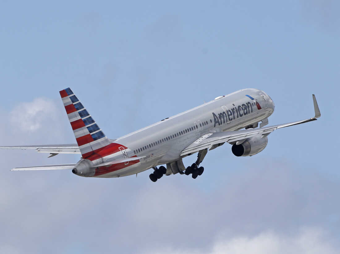 A flight was diverted after a passenger tried to open the
plane door 1
