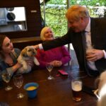 Photo shows UK PM Boris Johnson partying during 2020 COVID
lockdown 12