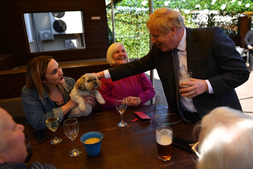 Photo shows UK PM Boris Johnson partying during 2020 COVID
lockdown 1