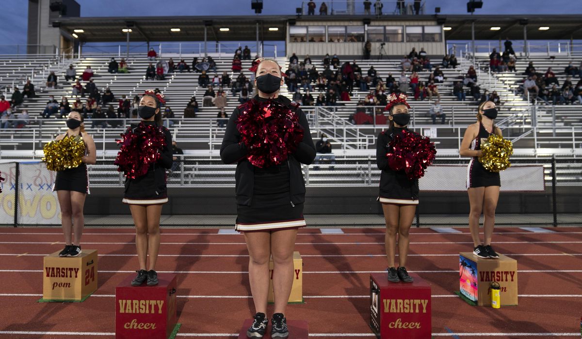 Cheerleaders protest mask mandate at New York high school
championship 1