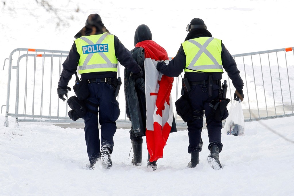 Canadian police arrest over 100 people in trucker
protests 1