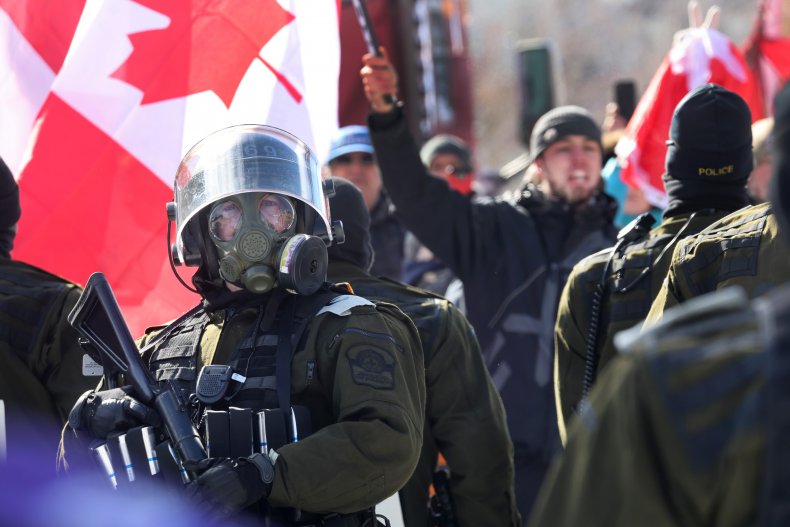 Video Appears to Show Police Horses Trampling Canadian
Trucker Protesters 1