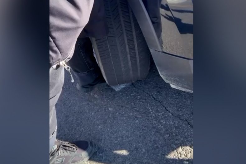 Video Appears To Show Deputy's Car Parked on Student
Protester's Foot 1