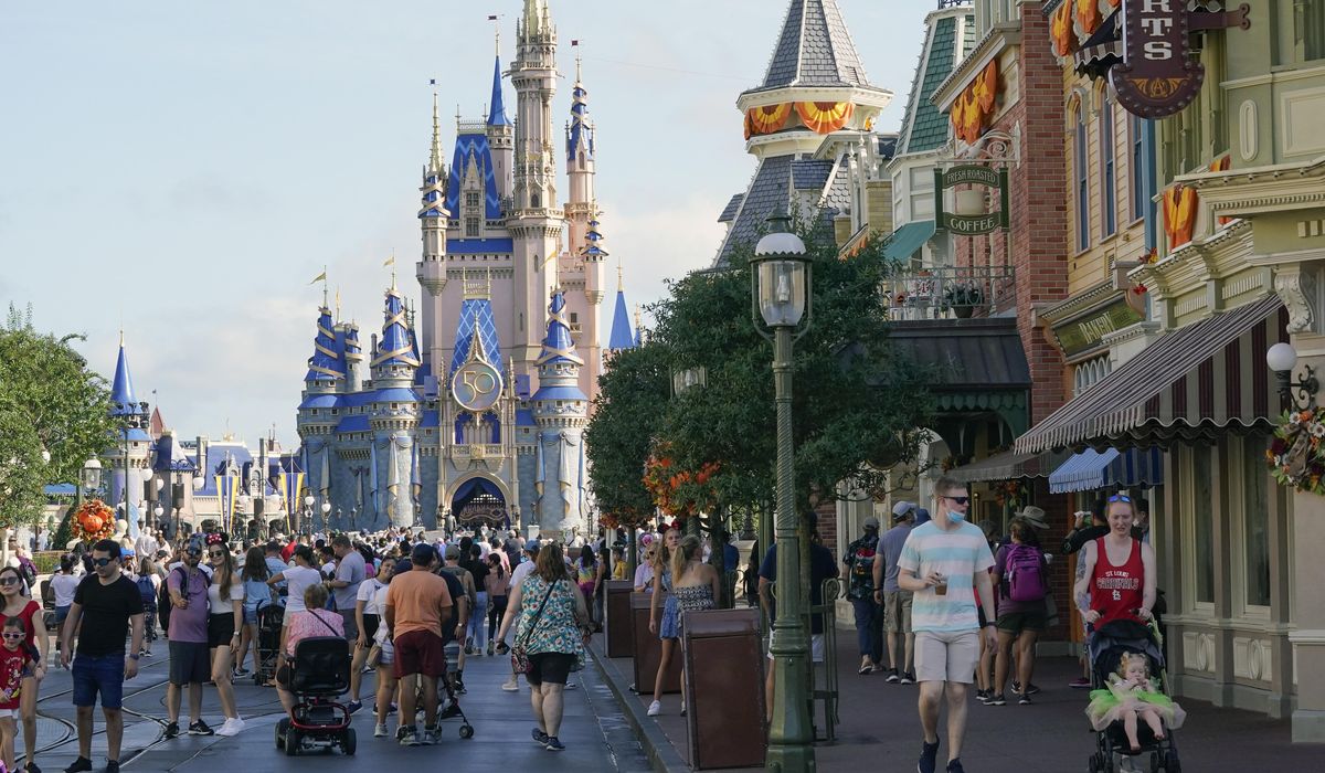 Disney theme parks in California and Florida to ease mask
rules Thursday 1