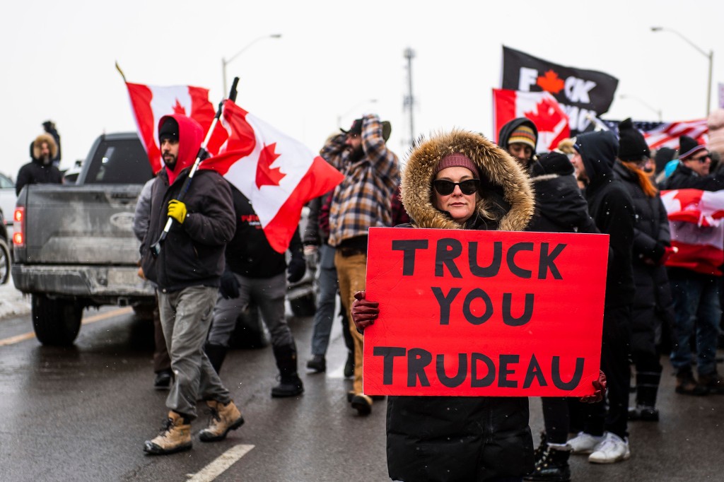 Four ‘Freedom Convoy’ protesters charged in plot to kill
Canadian cops 1