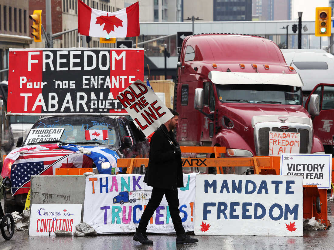 Truckers in Ottawa block a key border crossing, as their
protest morphs and drags on 1