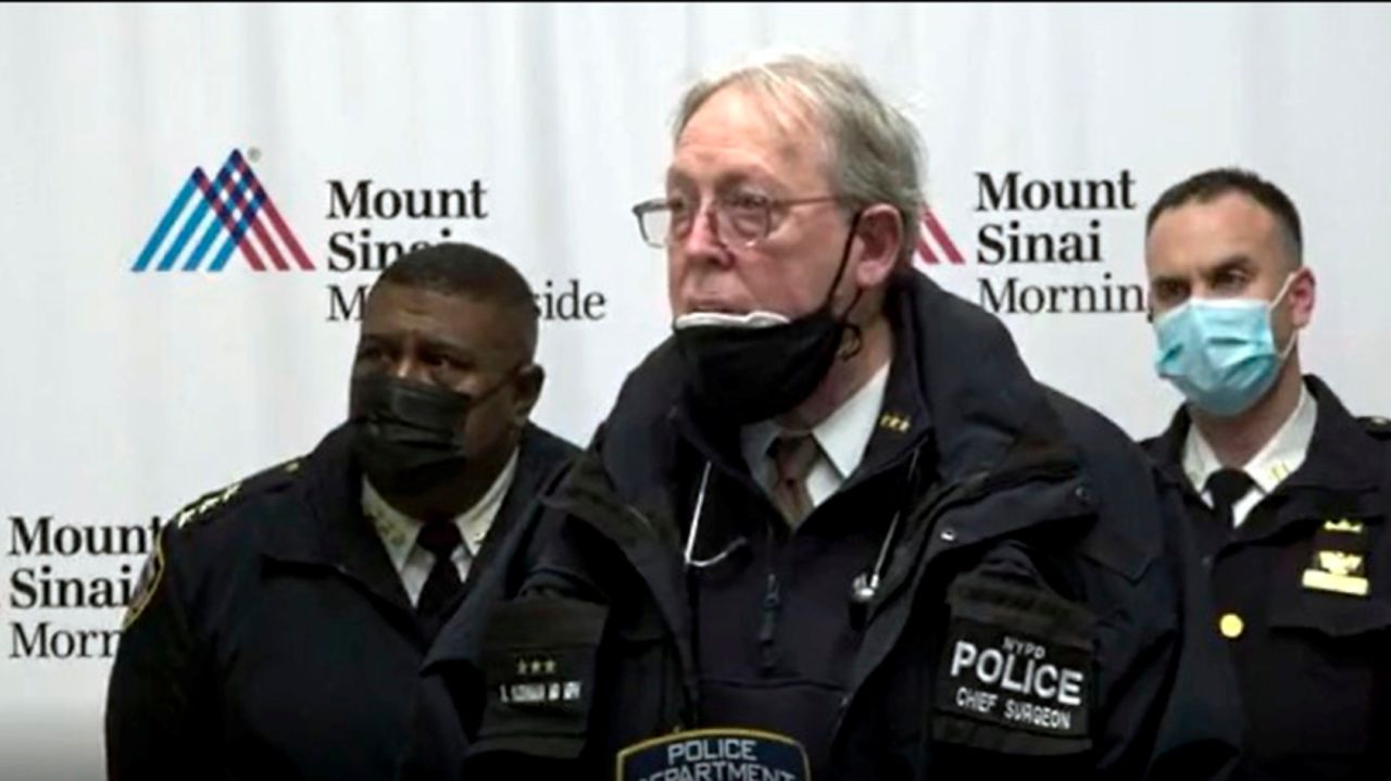 NYPD officer released from hospital after being shot in the
foot 1