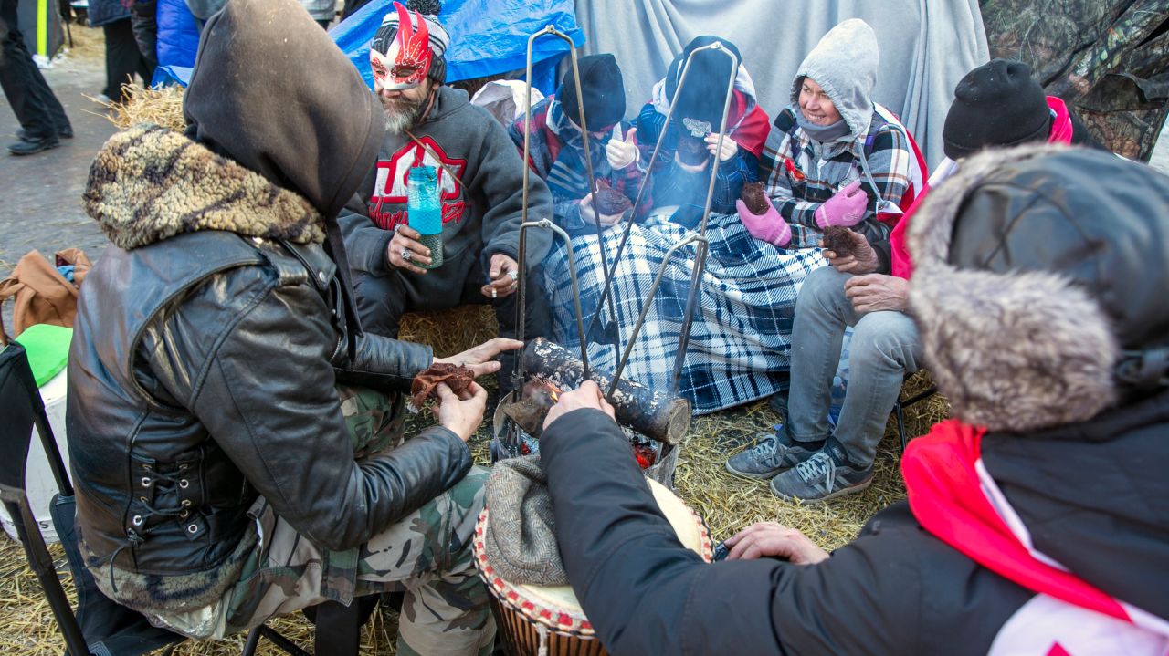 Ontario says it will drop vaccine proof, protests
persist 1