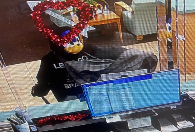 Hedgehog Day Afternoon: Florida Man in 'Sonic' Mask Tries to
Hold Up Bank 1