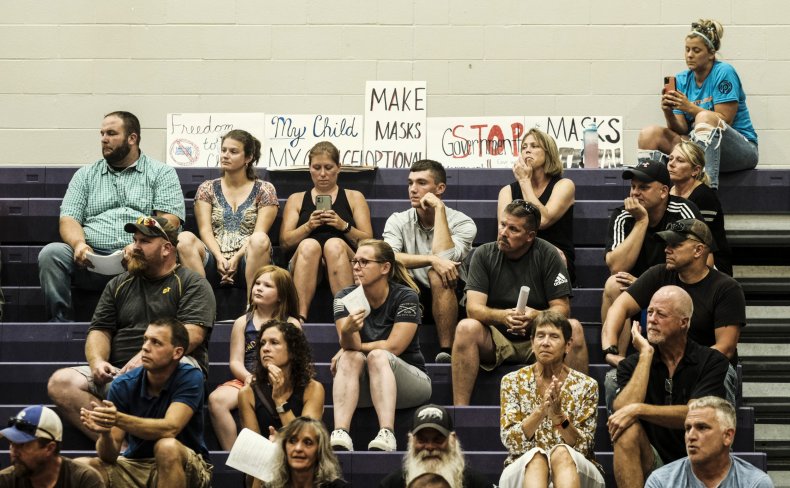Outrage as Security Forcibly Removes Maskless Dad From
School Board Meeting 1