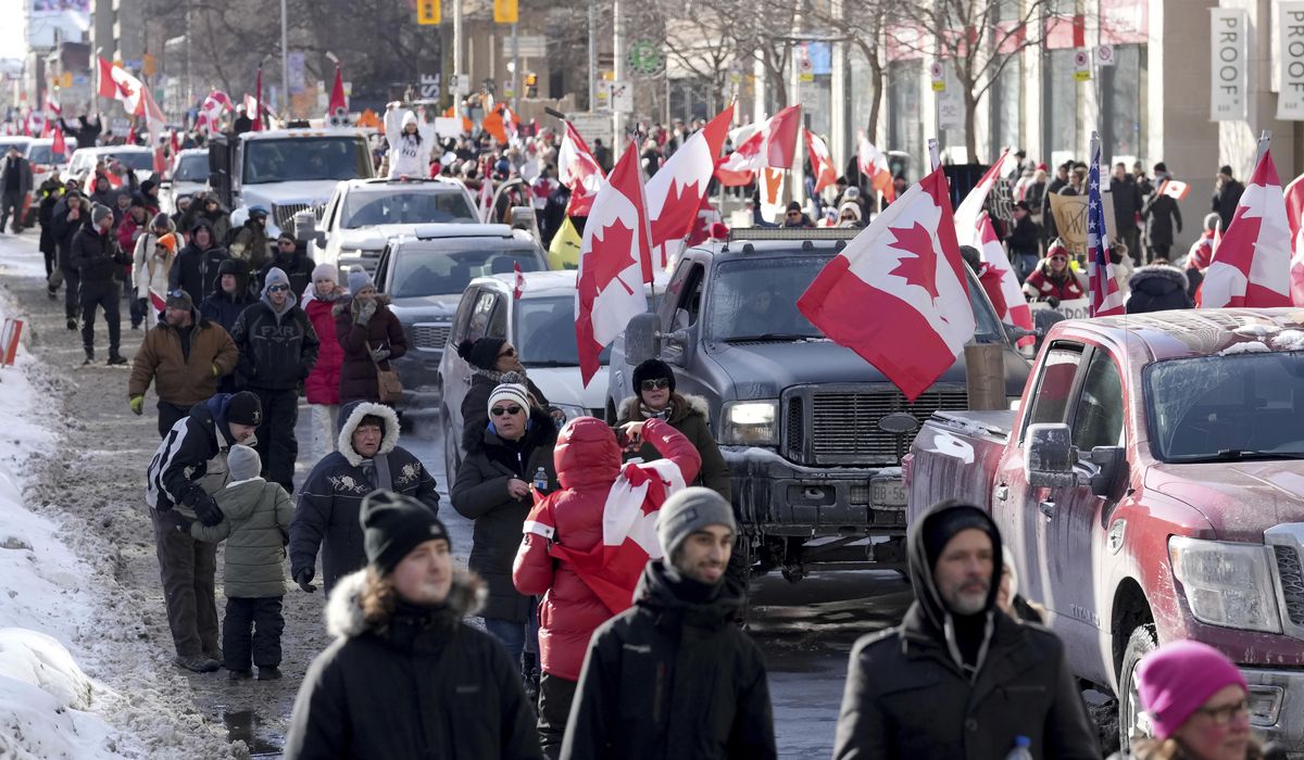 Alberta caves to Canada trucker protests, ends vaccine
passports 1