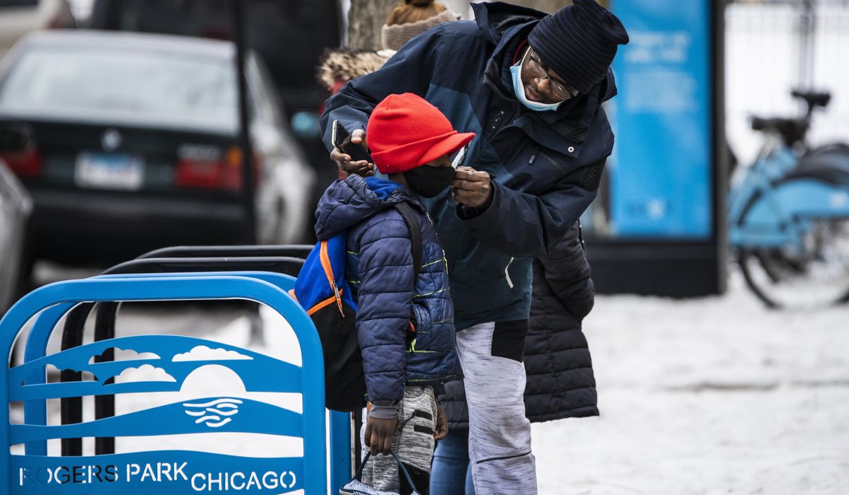 Chicago high school students walk out over mask
mandates 1