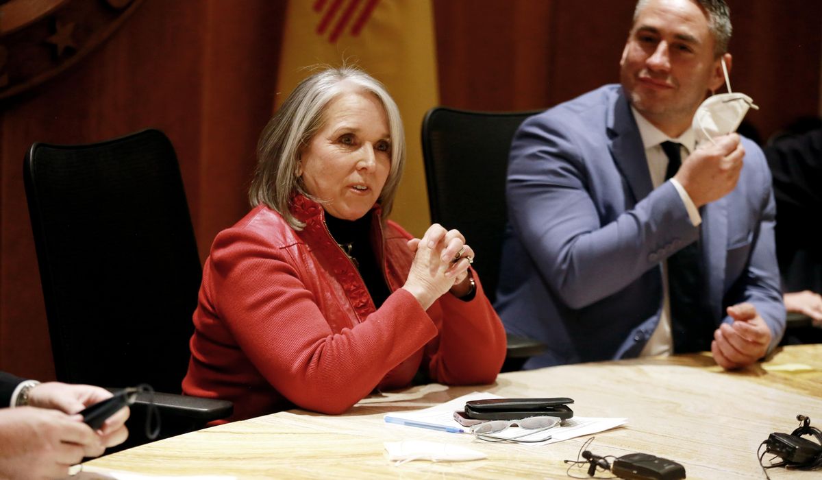 New Mexico governor lifts state's indoor mask
mandate 1