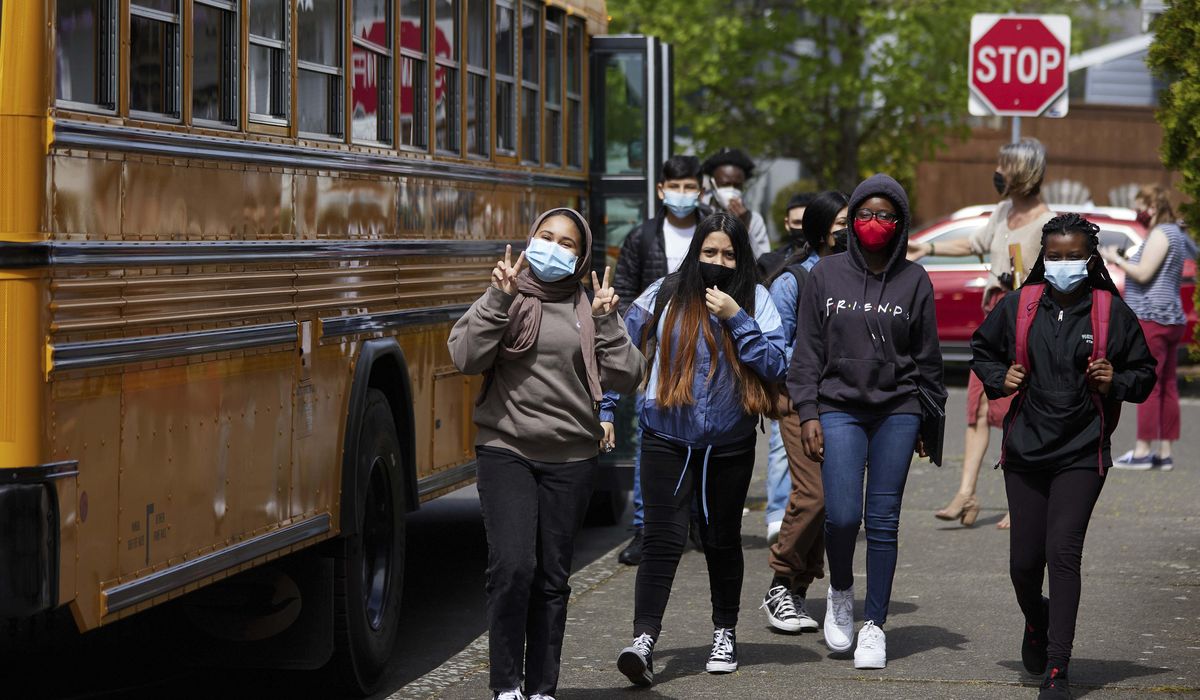 As state mask rules taper, pressure shifts to school
leaders 1